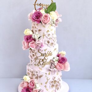 Pink & golden wedding cake