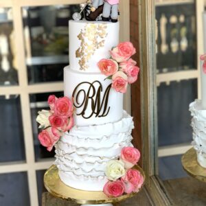 Tiered white pink floral cake